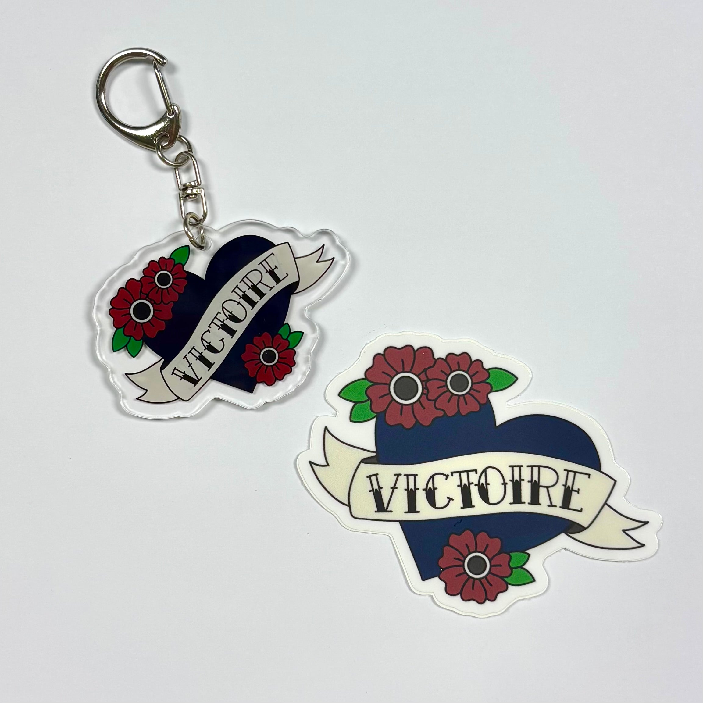 Victoire Hockey Vinyl Sticker & Acrylic Keychain